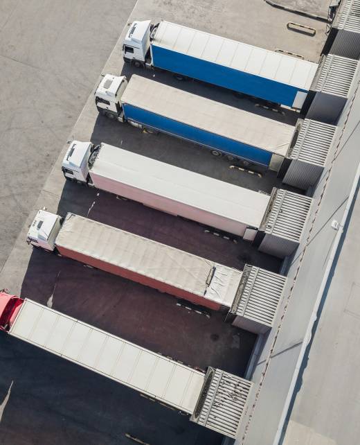 Trucks unloading in logostics center